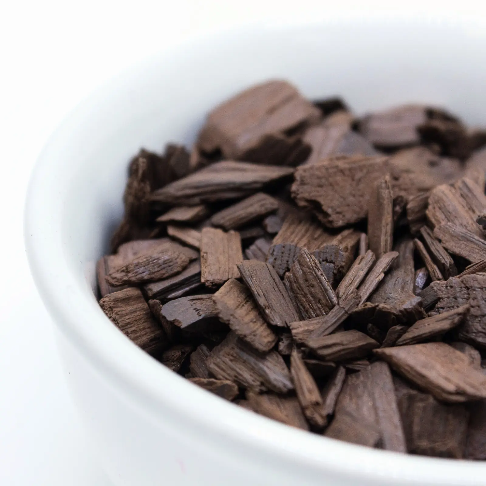 Dark product in bowl