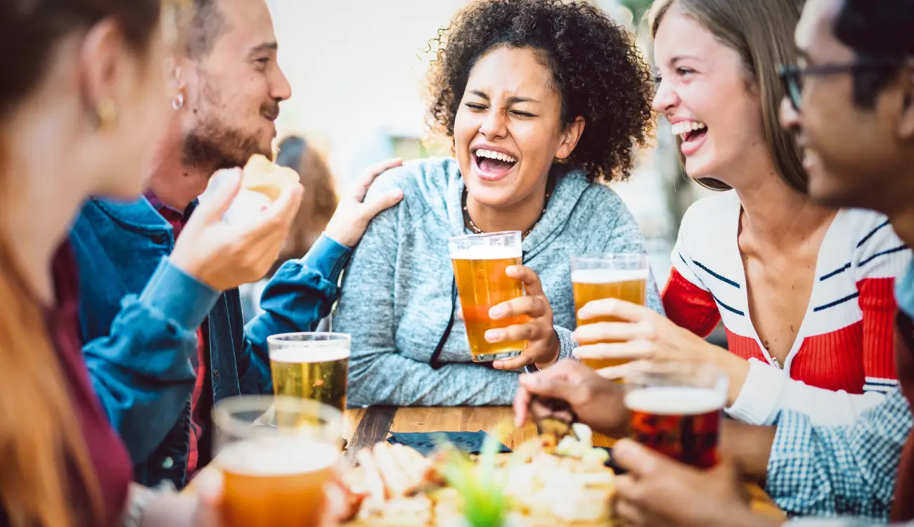 people sitting at table drinking
