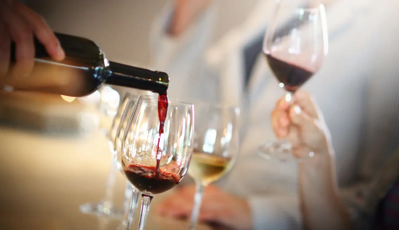 person drinking wine