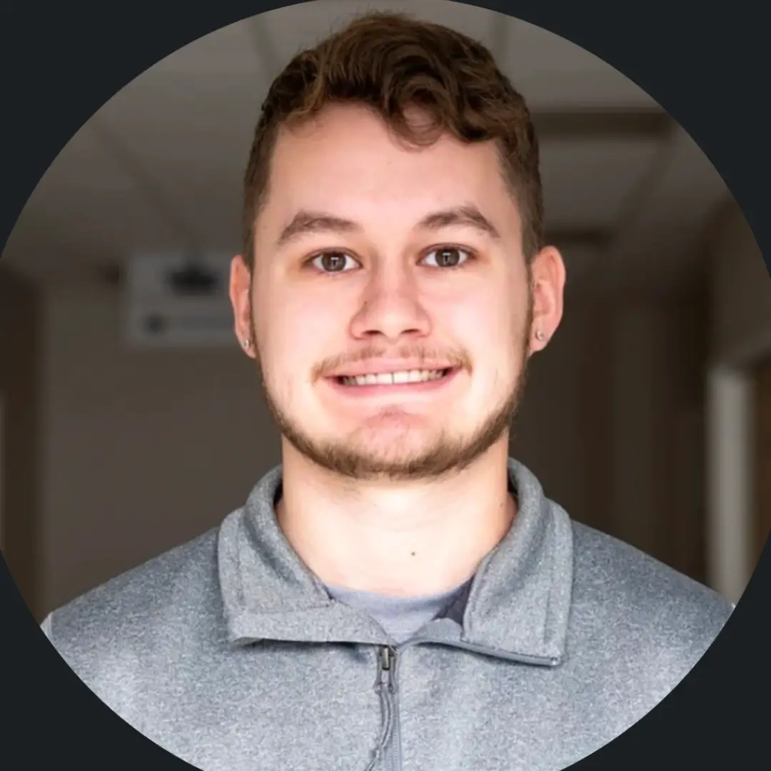 Green headshot of Brandon, marketing manager